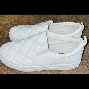 Quilted Faux Leather Slip-On Platform Sneakers.